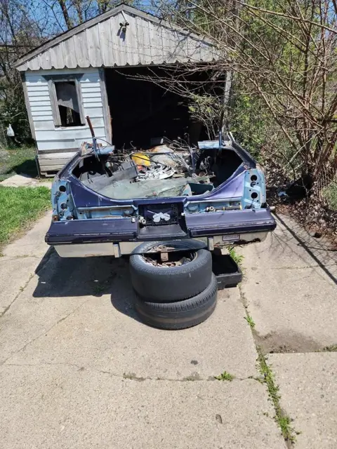 Abandoned car parts removed