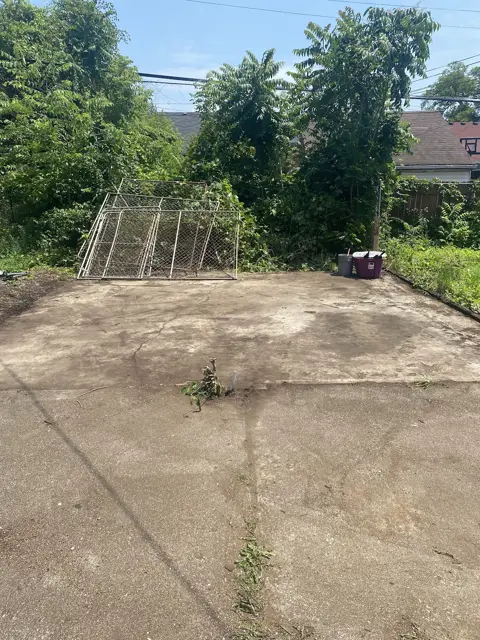 Garage demo, after: hauled away, slab swept