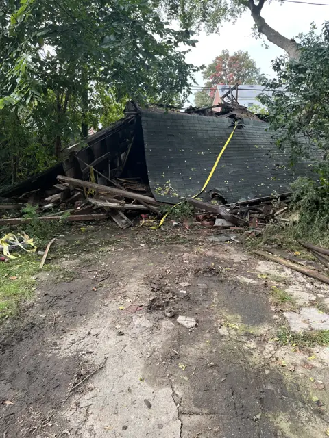 Detached garage being demolished in Detroit by AH Home Improvements